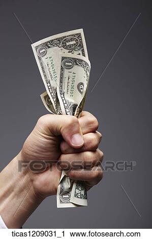 dollar bills in hand View Large Photo Image Stock Image - dollar bills in hand. Fotosearch