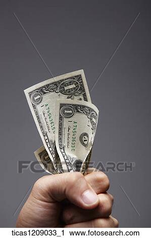 dollar bills in hand View Large Photo Image Stock Image - dollar bills in hand. Fotosearch