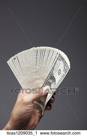 dollar bills in hand View Large Photo Image Stock Image - dollar bills in hand. Fotosearch