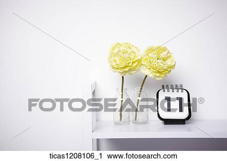 flowers in the bottle and calendar View Large Photo Image Stock Image - flowers in the bottle and calendar . Fotosearch