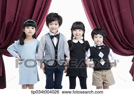 four kids on a stage with arms in arms View Large Photo Image Stock Photograph - four kids on a stage with arms in arms . Fotosearch