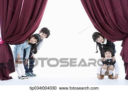 four kids posing on a stage with red curtains View Large Photo Image Stock Image - four kids posing on a stage with red curtains . Fotosearch