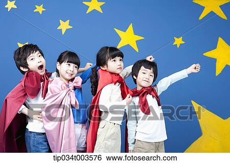 four kids wearing superman capes posing like superman View Large Photo Image Stock Photograph - four kids wearing superman capes posing like superman . Fotosearch