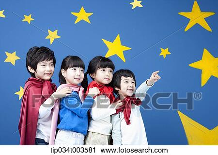 four kids wearing superman capes standing in a line View Large Photo Image Stock Image - four kids wearing superman capes standing in a line. Fotosearch