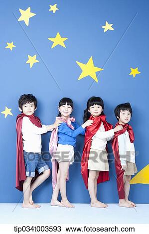 four kids wearing superman capes standing in a line in their side ways View Large Photo Image Stock Image - four kids wearing superman capes standing in a line in their side ways. Fotosearch
