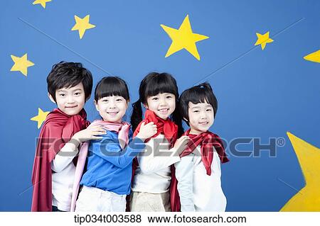 Stock Photo - four kids wearing superman capes standing in a line holding one another's shoulders. Fotosearch
