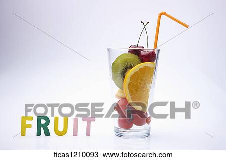 fruit letters next to a cup filled with cut fruits View Large Photo Image Stock Image - fruit letters next to a cup filled with cut fruits . Fotosearch