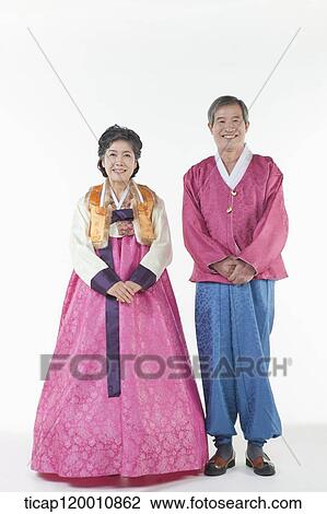 grandparents standing together in Hanbok View Large Photo Image Stock Image - grandparents standing together in Hanbok. Fotosearch