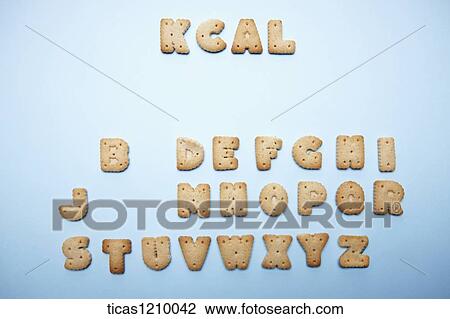 Stock Image - kcal letters extracted from alphabet cookies . Fotosearch