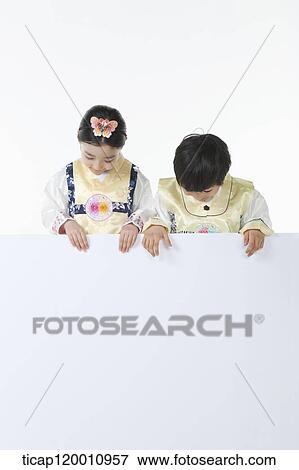 kids in Hanbok holding an empty whiteboard View Large Photo Image Stock Photo - kids in Hanbok holding an empty whiteboard. Fotosearch