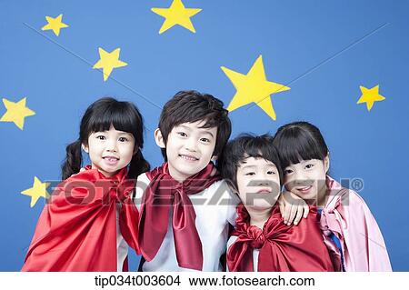 kids wearing superman capes posing with arms around each other View Large Photo Image Picture - kids wearing superman capes posing with arms around each other. Fotosearch
