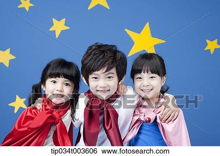 kids wearing superman capes posing with arms around each other View Large Photo Image Stock Photograph - kids wearing superman capes posing with arms around each other. Fotosearch