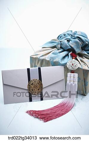 Stock Image - Korean traditional envelope and a package wrapped in a traditional wrap . Fotosearch