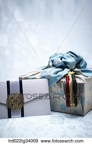 Korean traditional envelope and a package wrapped in a traditional wrap View Large Photo Image Stock Photo - Korean traditional envelope and a package wrapped in a traditional wrap . Fotosearch