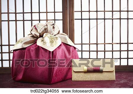 Korean traditional envelope and a package in front of Korean traditional paper door View Large Photo Image Stock Photography - Korean traditional envelope and a package in front of Korean traditional paper door. Fotosearch