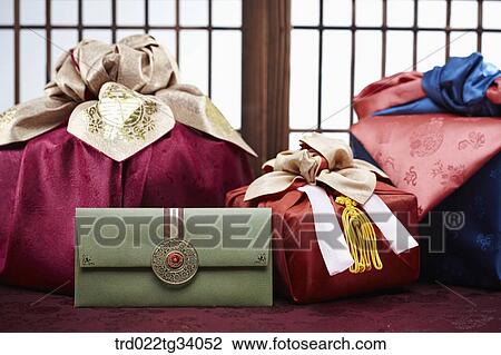 Korean traditional envelope and packages in front of Korean traditional paper door View Large Photo Image Stock Image - Korean traditional envelope and packages in front of Korean traditional paper door. Fotosearch