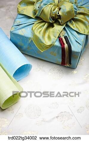 Korean traditional papers next to a package wrapped in traditional wrap View Large Photo Image Stock Image - Korean traditional papers next to a package wrapped in traditional wrap . Fotosearch