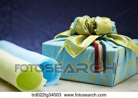 Korean traditional papers next to a package wrapped in traditional wrap View Large Photo Image Stock Image - Korean traditional papers next to a package wrapped in traditional wrap . Fotosearch