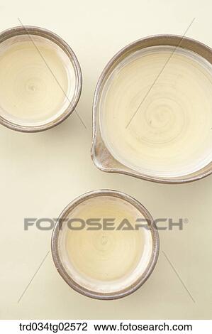 Stock Image - Korean traditional tea in Korean traditional cups. Fotosearch