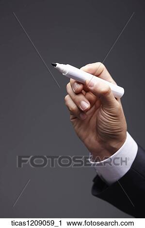man grabbing a pen View Large Photo Image Stock Image - man grabbing a pen . Fotosearch
