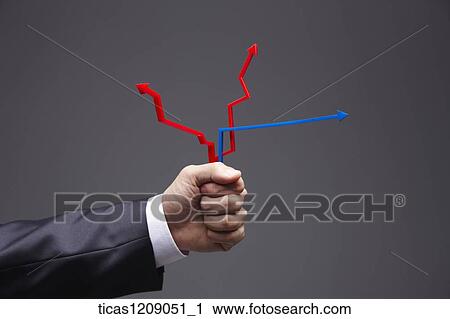 Stock Image - man holding arrows in his hand . Fotosearch