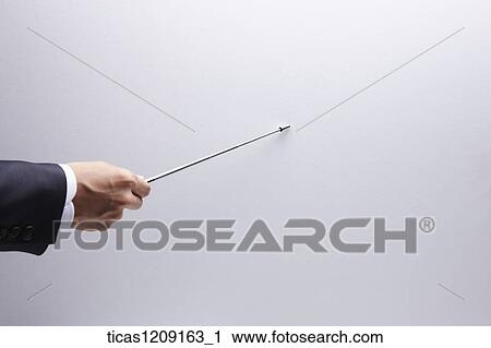 man pointing out the wall with stick View Large Photo Image Stock Image - man pointing out the wall with stick. Fotosearch