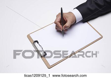 man writing on the paper with a pen View Large Photo Image Stock Image - man writing on the paper with a pen. Fotosearch
