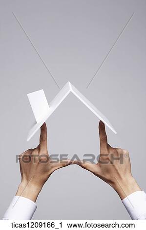 mockup of house made up of hands and plastic roof View Large Photo Image Stock Image - mockup of house made up of hands and plastic roof . Fotosearch