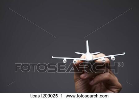 mockup of plane in hand View Large Photo Image Stock Image - mockup of plane in hand . Fotosearch
