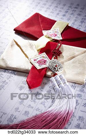 Stock Image - norigae on Korean traditional cloth wallet. Fotosearch