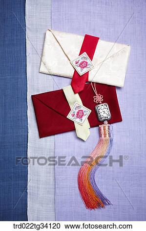 norigae on Korean traditional envelopes on a traditional cloth View Large Photo Image Stock Image - norigae on Korean traditional envelopes on a traditional cloth. Fotosearch
