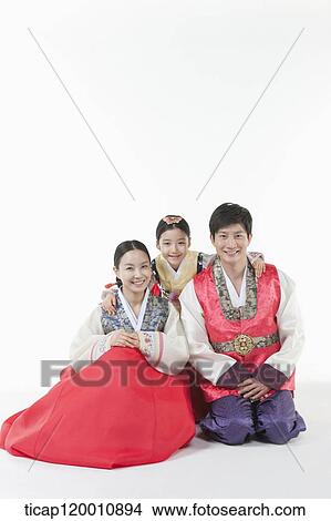 parents and a daughter in Hanbok posing together View Large Photo Image Picture - parents and a daughter in Hanbok posing together . Fotosearch