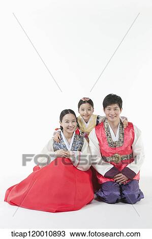 parents and a daughter in Hanbok posing together View Large Photo Image Stock Image - parents and a daughter in Hanbok posing together . Fotosearch