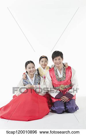 parents and a daughter in Hanbok posing together View Large Photo Image Stock Photograph - parents and a daughter in Hanbok posing together . Fotosearch