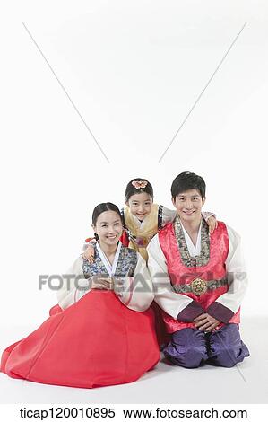 parents and a daughter in Hanbok posing together View Large Photo Image Stock Photography - parents and a daughter in Hanbok posing together . Fotosearch