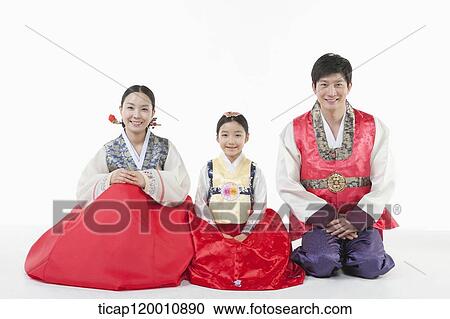parents and a daughter in Hanbok sitting on a floor View Large Photo Image Stock Image - parents and a daughter in Hanbok sitting on a floor. Fotosearch
