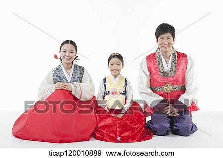 parents and a daughter in Hanbok sitting on a floor View Large Photo Image Stock Photo - parents and a daughter in Hanbok sitting on a floor. Fotosearch