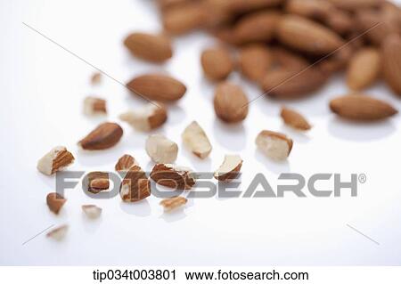 pieces of almonds and bunch of almonds View Large Photo Image Stock Image - pieces of almonds and bunch of almonds. Fotosearch
