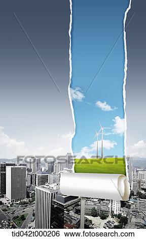 Stock Photograph - ripping a paper picture of a dark polluted city . Fotosearch