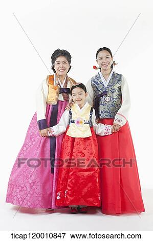three generation family posing together View Large Photo Image Stock Photo - three generation family posing together . Fotosearch