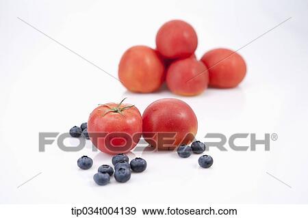 tomatoes and blueberries View Large Photo Image Stock Photo - tomatoes and blueberries . Fotosearch