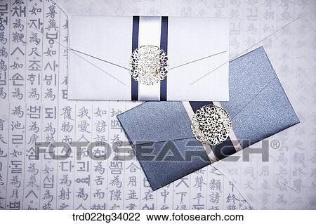 Stock Image - two Korean traditional envelopes in Korean traditional background . Fotosearch