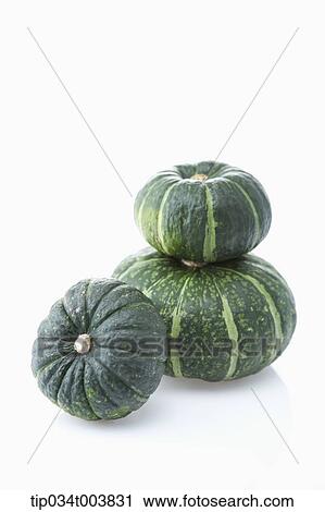 two pumpkins piled up while one pumpkin remains leaned on lower pumpkin View Large Photo Image Stock Image - two pumpkins piled up while one pumpkin remains leaned on lower pumpkin. Fotosearch