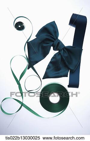 Stock Illustration - a blue bow tie with a green ribbon. Fotosearch