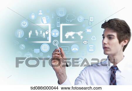 Stock Illustration - a business man touching a screen with icons with a pen. Fotosearch