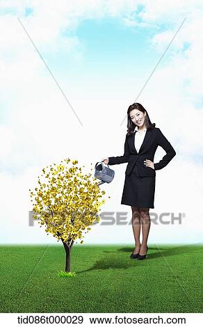 Stock Illustration - a businesswoman watering gold plant. Fotosearch