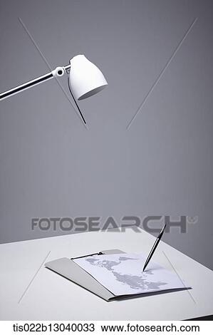 A Desk Lamp And A World Map Drawing Tis022b13040033 Fotosearch
