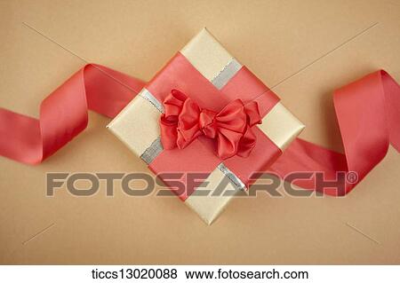 a gift box with red ribbons View Large Illustration Stock Illustration - a gift box with red ribbons. Fotosearch