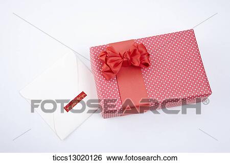 Stock Illustration - a gift box with ribbon. Fotosearch