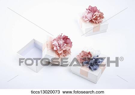 Drawing - a gift with pink and blue flowers. Fotosearch